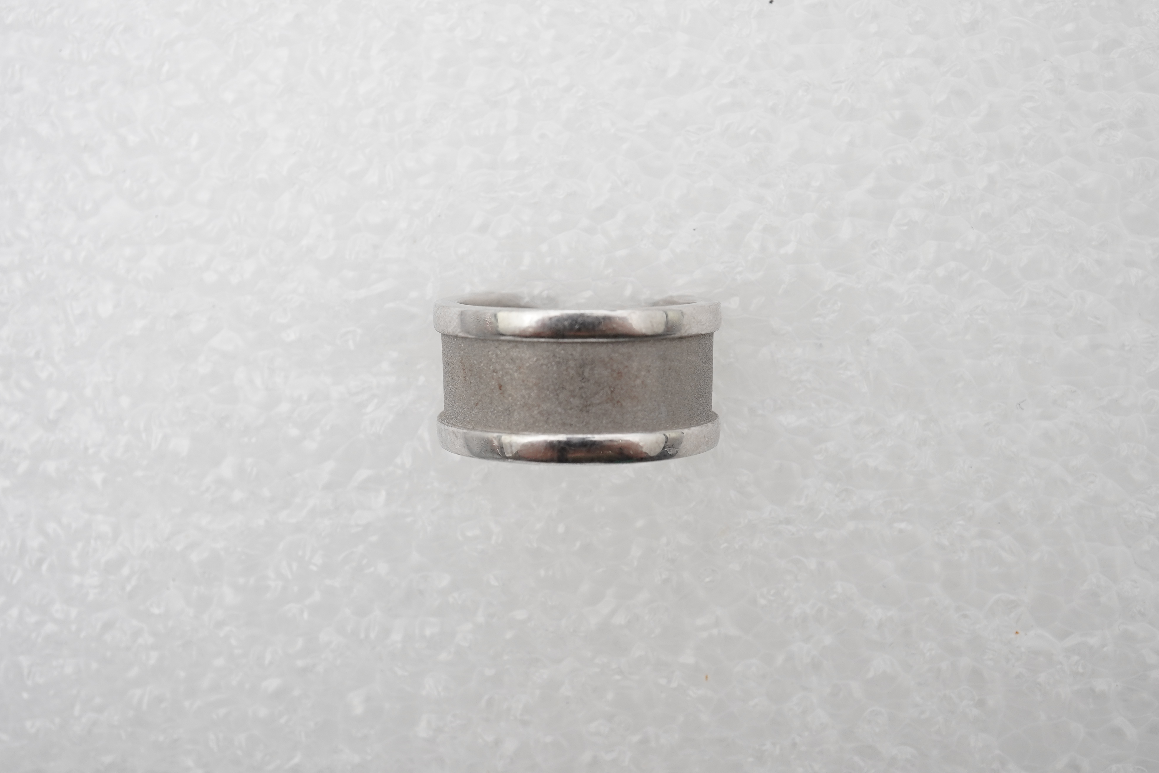 Cartier, a white gold ring, 'C de Cartier', circa 2000